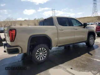2023 GMC Sierra 1500 AT4 with VIN 1GTUUEE89PZ141446, listed as a Copart auction lot 52630095 with 35,182 mi miles and Salvage title. Bid and sale history available at DreamBid. Image 3.