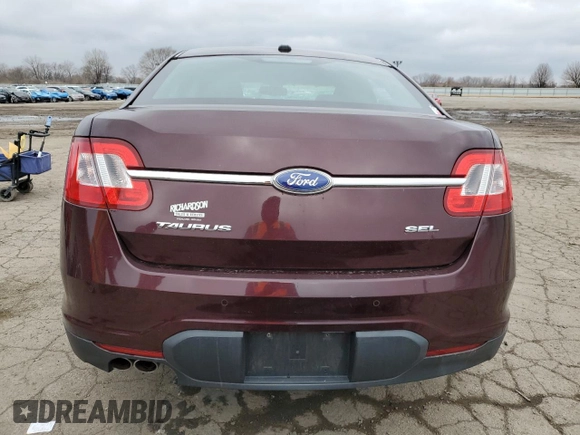 2011 Ford Taurus SEL z VIN 1FAHP2EW4BG167369, wystawiony jako Copart lot #52797525 z przebiegiem 98 696 mil mil oraz Czysty tytuł • Clean title. Historia ofert i sprzedaży dostępna na DreamBid. Obrazek 6.