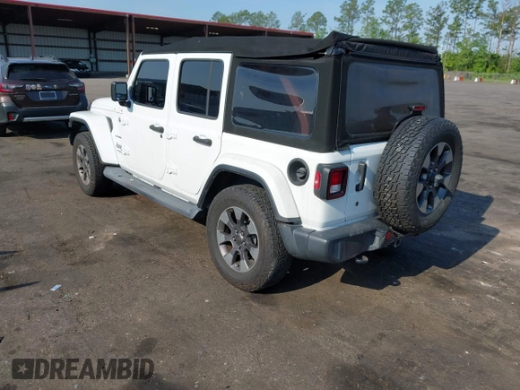 2018 Jeep Wrangler Unlimited Sahara z VIN 1C4HJXEG3JW175226, wystawiony jako IAAI lot #42307456 z przebiegiem 72 875 mil mil oraz . Historia ofert i sprzedaży dostępna na DreamBid. Obrazek 3.