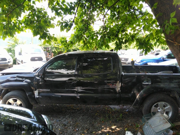 2014 Toyota Tacoma with VIN 3TMMU4FN6EM072471, listed as a IAAI auction lot 42525218 with 150,461 mi miles and . Bid and sale history available at DreamBid. Image 15.
