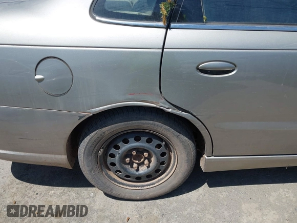 2003 Saturn LS z VIN 1G8JU54F73Y506784, wystawiony jako IAAI lot #42286124 z przebiegiem 202 185 mil mil oraz . Historia ofert i sprzedaży dostępna na DreamBid. Obrazek 6.