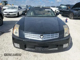 2005 Cadillac XLR z VIN 1G6YV34A955600330, wystawiony jako Copart lot #76173224 z przebiegiem Nie podano mil oraz Szkody całkowita. Historia ofert i sprzedaży dostępna na DreamBid. Obrazek 5.