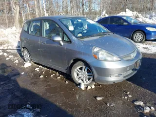 2007 Honda Fit Sport with VIN JHMGD37647S064795, listed as a IAAI auction lot 41299330 with 71,493 mi miles. Bid and sale history available at carsss.com. Image 1.