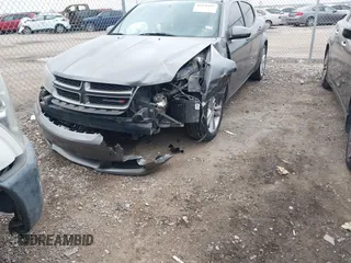 2013 Dodge Avenger SXT with VIN 1C3CDZCB1DN576762, listed as a IAAI auction lot 41938493 with 168,149 mi miles and . Bid and sale history available at carsss.com. Image 6.