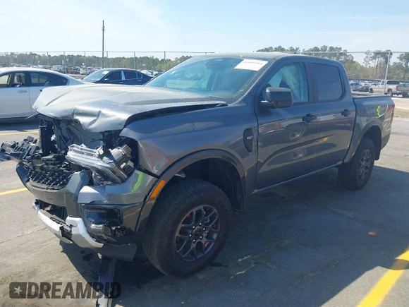 2024 Ford Ranger XLT with VIN 1FTER4GHXRLE46487, listed as a IAAI auction lot 41899384 with 5,570 mi miles. Bid and sale history available at carsss.com. Image 17.