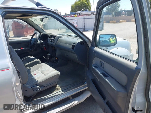 2001 Nissan Frontier SE Desert Runner z VIN 1N6ED26T51C362345, wystawiony jako IAAI lot #42324055 z przebiegiem 233 809 mil mil oraz . Historia ofert i sprzedaży dostępna na DreamBid. Obrazek 5.