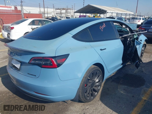 2022 Tesla Model 3 Performance with VIN 5YJ3E1EC1NF144236, listed as a IAAI auction lot 41189644 with Not Provided miles. Bid and sale history available at carsss.com. Image 4.