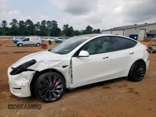 2022 Tesla Model Y Performance с VIN 7SAYGDEF3NF557029, выставлен на аукционе Copart как лот 59389115 с пробегом 54 725 миль миль и Списание • Salvage title. История ставок и продаж доступна на DreamBid. Изображение 1.