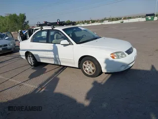 2002 Kia Spectra z VIN KNAFB121825132605, wystawiony jako IAAI lot #42512524 z przebiegiem 132 897 mil mil oraz . Historia ofert i sprzedaży dostępna na DreamBid. Obrazek 1.