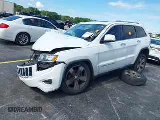 2014 Jeep Grand Cherokee Limited with VIN 1C4RJEBGXEC449252, listed as a IAAI auction lot 39946044 with 1 mi miles. Bid and sale history available at carsss.com. Image 2.