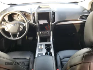 2023 Ford Edge SEL z VIN 2FMPK4J90PBA38667, wystawiony jako Copart lot #54534815 z przebiegiem Nie podano mil oraz Szkoda całkowita • Salvage title. Historia ofert i sprzedaży dostępna na DreamBid. Obrazek 8.