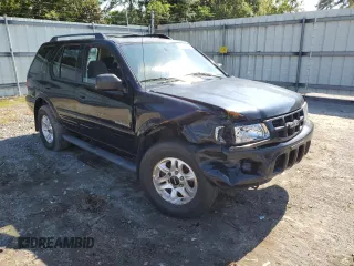 2002 Isuzu Rodeo S z VIN 4S2CK58W924321032, wystawiony jako Copart lot #66145264 z przebiegiem 184 325 mil mil oraz Szkody całkowita. Historia ofert i sprzedaży dostępna na DreamBid. Obrazek 4.