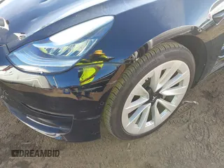 2022 Tesla Model 3 with VIN 5YJ3E1EA9NF295890, listed as a IAAI auction lot 41175917 with 42,230 mi miles and . Bid and sale history available at DreamBid. Image 23.