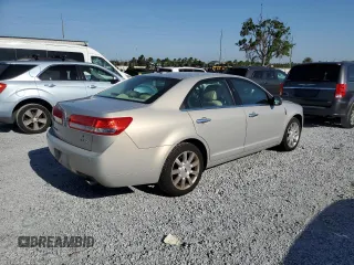 2010 Lincoln MKZ z VIN 3LNHL2GC8AR644901, wystawiony jako Copart lot #56098095 z przebiegiem 165 989 mil mil oraz Nie do naprawy • Non repairable. Historia ofert i sprzedaży dostępna na DreamBid. Obrazek 3.