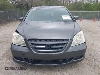 2007 Honda Odyssey EX-L with VIN 5FNRL38767B406636, listed as a IAAI auction lot 42032947 with 228,139 mi miles and . Bid and sale history available at carsss.com. Image 12.