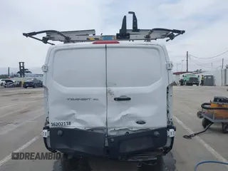 2020 Ford Transit Cargo z VIN 1FTYE1Y86LKA19374, wystawiony jako IAAI lot #42362018 z przebiegiem 93 512 mil mil oraz . Historia ofert i sprzedaży dostępna na DreamBid. Obrazek 17.