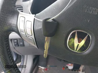 2004 Acura TSX with VIN JH4CL96844C030143, listed as a IAAI auction lot 42035820 with 216,588 mi miles. Bid and sale history available at carsss.com. Image 11.