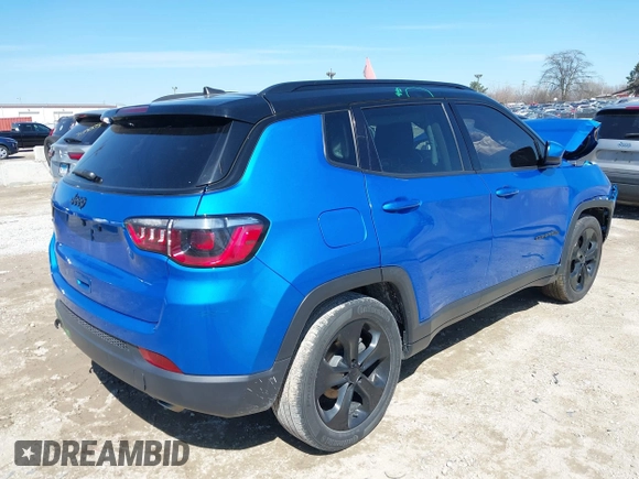 2021 Jeep Compass Altitude with VIN 3C4NJCBB0MT523322, listed as a IAAI auction lot 41989408 with 64,880 mi miles. Bid and sale history available at carsss.com. Image 4.