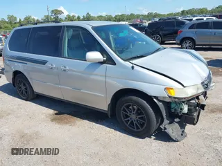 2004 Honda Odyssey EX-L z VIN 5FNRL18744B097944, wystawiony jako IAAI lot #42319441 z przebiegiem 168 463 mil mil oraz . Historia ofert i sprzedaży dostępna na DreamBid. Obrazek 1.