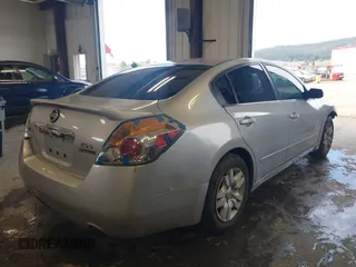 2011 Nissan Altima S with VIN 1N4AL2AP5BN448698, listed as a IAAI auction lot 42185080 with 165,297 mi miles and . Bid and sale history available at carsss.com. Image 4.