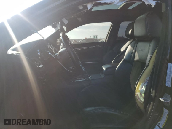 2013 Chrysler 300 SRT-8 with VIN 2C3CCAFJ8DH646483, listed as a Copart auction lot 83261144 with 86,015 mi miles and Salvage Title. Bid and sale history available at DreamBid. Image 7.