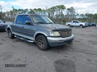 2003 Ford F-150 XLT with VIN 1FTRW07L13KA54535, listed as a IAAI auction lot 41766119 with 236,854 mi miles. Bid and sale history available at carsss.com. Image 1.