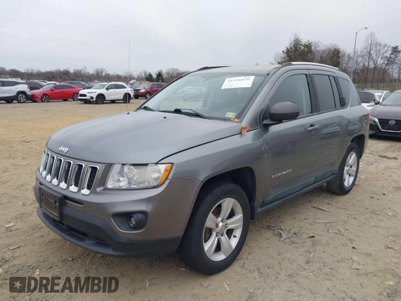 2011 Jeep Compass with VIN 1J4NT1FA2BD241485, listed as a IAAI auction lot 41496076 with 134,825 mi miles. Bid and sale history available at carsss.com. Image 2.