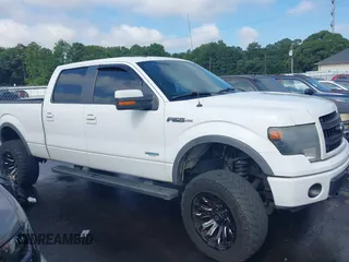 2014 Ford F-150 XL with VIN 1FTFW1ET3EFB42154, listed as a IAAI auction lot 42656209 with 297,149 mi miles and . Bid and sale history available at DreamBid. Image 13.