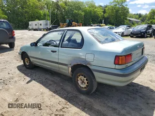 1992 Toyota Tercel z VIN JT2EL43B1N0209927, wystawiony jako Copart lot #57595275 z przebiegiem 87 577 mil mil oraz Tytuł czysty. Historia ofert i sprzedaży dostępna na DreamBid. Obrazek 2.