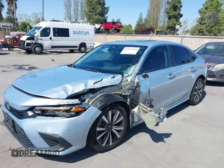 2022 Honda Civic Sedan EX with VIN 2HGFE1F77NH309152, listed as a IAAI auction lot 42013565 with 25,474 mi miles. Bid and sale history available at carsss.com. Image 12.