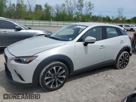 2019 Mazda CX-3 Touring z VIN JM1DKFC76K1451342, wystawiony jako Copart lot #58413935 z przebiegiem 21 391 mil mil oraz Szkoda całkowita • Salvage title. Historia ofert i sprzedaży dostępna na DreamBid. Obrazek 1.