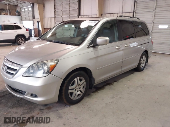 2006 Honda Odyssey EX-L z VIN 5FNRL38746B461357, wystawiony jako IAAI lot #41040746 z przebiegiem 256 047 mil mil oraz . Historia ofert i sprzedaży dostępna na DreamBid. Obrazek 2.