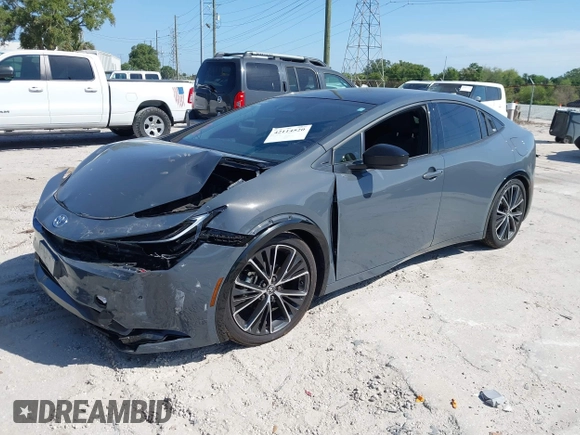 2024 Toyota Prius LE z VIN JTDACAAU4R3023781, wystawiony jako IAAI lot #42114520 z przebiegiem 20 884 mil mil oraz . Historia ofert i sprzedaży dostępna na DreamBid. Obrazek 2.