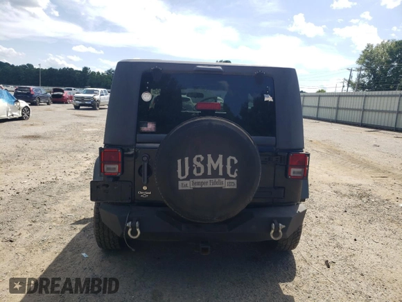 2012 Jeep Wrangler Sport z VIN 1C4AJWAG2CL245174, wystawiony jako Copart lot #63161425 z przebiegiem 136 626 mil mil oraz Czysty tytuł • Clean title. Historia ofert i sprzedaży dostępna na DreamBid. Obrazek 6.