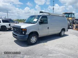 2014 Ford Econoline Cargo Commercial z VIN 1FTNE1EW6EDB05698, wystawiony jako IAAI lot #42236705 z przebiegiem 162 416 mil mil oraz . Historia ofert i sprzedaży dostępna na DreamBid. Obrazek 2.