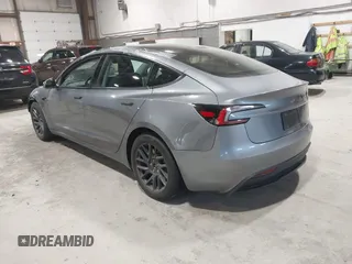 2024 Tesla Model 3 Long Range with VIN 5YJ3E1EB0RF860736, listed as a IAAI auction lot 41966827 with 5,134 mi miles and . Bid and sale history available at DreamBid. Image 3.