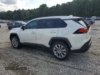 2021 Toyota RAV4 XLE Premium with VIN 2T3A1RFV6MW142184, listed as a Copart auction lot 60983715 with 31,814 mi miles and Salvage title. Bid and sale history available at DreamBid. Image 2.