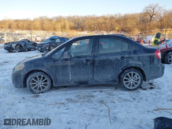 2008 Suzuki SX4 Touring Pkg 2 with VIN JS2YC417785100372, listed as a IAAI auction lot 41411720 with 179,468 mi miles. Bid and sale history available at carsss.com. Image 15.