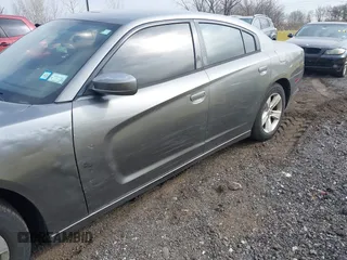 2011 Dodge Charger SE with VIN 2B3CL3CG0BH577061, listed as a IAAI auction lot 41889210 with 147,555 mi miles. Bid and sale history available at carsss.com. Image 13.