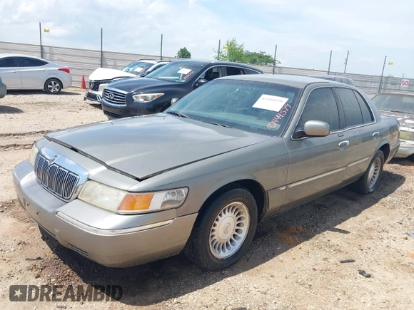 2002 Mercury Grand Marquis LS Premium z VIN 2MEFM75W22X617584, wystawiony jako IAAI lot #42444579 z przebiegiem 199 914 mil mil oraz . Historia ofert i sprzedaży dostępna na DreamBid. Obrazek 2.