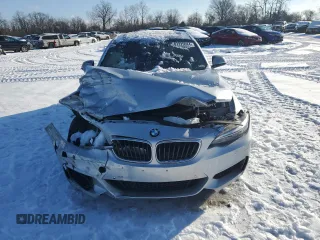2016 BMW 2 Series M235i xDrive with VIN WBA1J9C50GV372199, listed as a Copart auction lot 87229084 with 0 mi miles and Salvage Title. Bid and sale history available at carsss.com. Image 5.