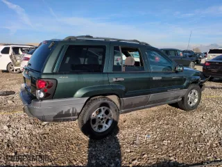 2001 Jeep Grand Cherokee Laredo with VIN 1J4GW48N21C570404, listed as a Copart auction lot 85996954 with 153,838 mi miles and Salvage Title. Bid and sale history available at carsss.com. Image 3.