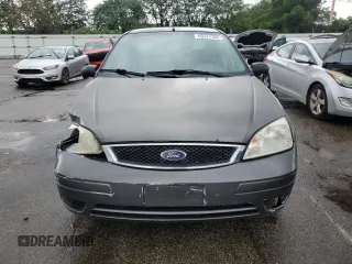 2007 Ford Focus S z VIN 1FAHP34N27W144992, wystawiony jako Copart lot #65571385 z przebiegiem 194 933 mil mil oraz Szkoda całkowita • Salvage title. Historia ofert i sprzedaży dostępna na DreamBid. Obrazek 5.