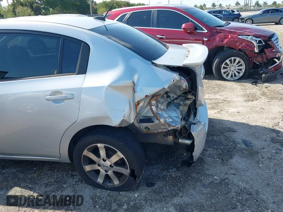 2012 Nissan Sentra S with VIN 3N1AB6AP6CL666593, listed as a IAAI auction lot 41995732 with 142,396 mi miles and . Bid and sale history available at DreamBid. Image 6.