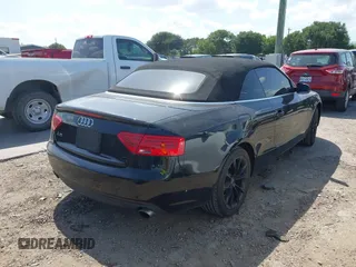 2014 Audi A5 Premium with VIN WAUAFAFH1EN003325, listed as a IAAI auction lot 42527376 with 72,644 mi miles and . Bid and sale history available at DreamBid. Image 4.
