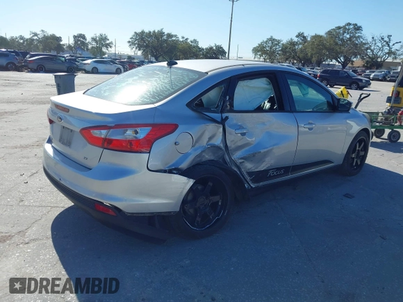 2012 Ford Focus SE with VIN 1FAHP3F23CL265724, listed as a IAAI auction lot 41184121 with 216,873 mi miles. Bid and sale history available at carsss.com. Image 4.