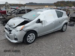 2013 Toyota Prius One z VIN JTDKDTB31D1545100, wystawiony jako IAAI lot #40760019 z przebiegiem 212 999 mil mil oraz . Historia ofert i sprzedaży dostępna na DreamBid. Obrazek 18.