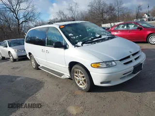 1998 Dodge Caravan LE with VIN 1B4GP54L7WB698340, listed as a IAAI auction lot 41252162 with 99,073 mi miles and . Bid and sale history available at carsss.com. Image 1.