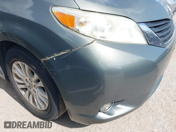 2014 Toyota Sienna XLE with VIN 5TDYK3DC2ES448876, listed as a IAAI auction lot 42519351 with 154,601 mi miles and . Bid and sale history available at DreamBid. Image 17.