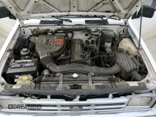 1990 Nissan Frontier z VIN 1N6SD11S8LC377906, wystawiony jako Copart lot #54840925 z przebiegiem 131 024 mil mil oraz Szkody całkowita. Historia ofert i sprzedaży dostępna na DreamBid. Obrazek 11.